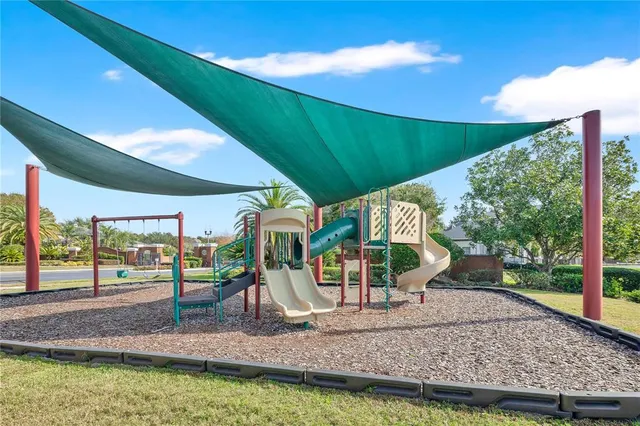 a view of a park with slide
