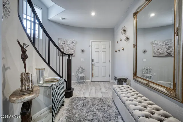 a view of entryway with wooden floor