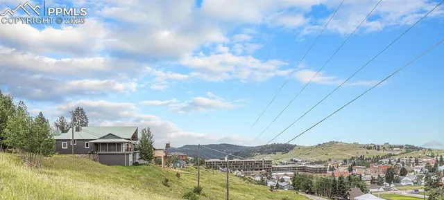 a view of a terrace with a lake view