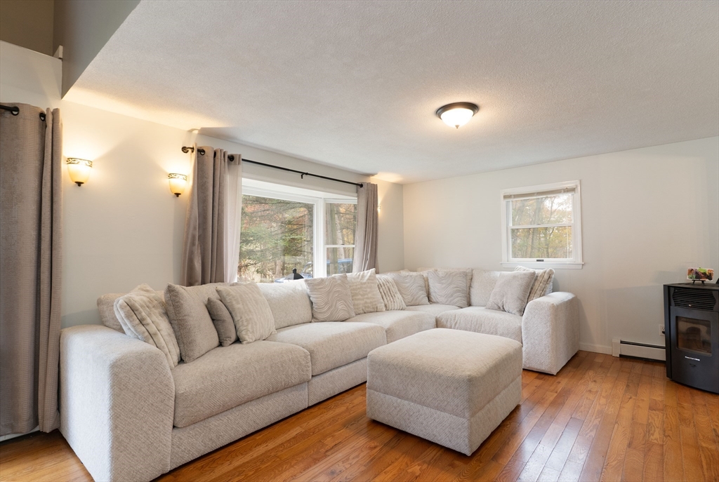15 Cherokee Road Holland, MA 01521 - Photo 20 of 42 a living room with furniture and a window