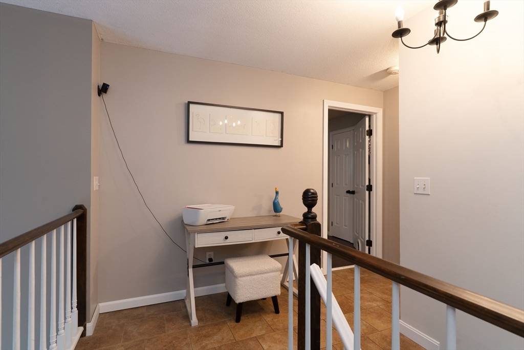 15 Cherokee Road Holland, MA 01521 - Photo 22 of 42 a view of a room with furniture and wooden floor