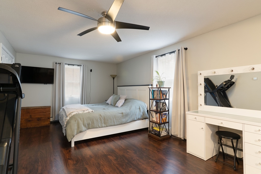 15 Cherokee Road Holland, MA 01521 - Photo 33 of 42 a bedroom with a bed and a walk in closet