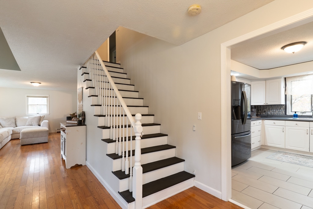 15 Cherokee Road Holland, MA 01521 - Photo 8 of 42 a view of entryway and hall with wooden floor