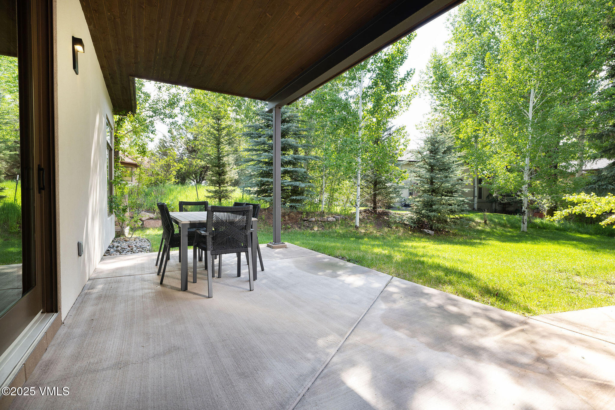 232 Stetson Drive Edwards, CO 81632 - Photo 13 of 25 a view of a porch with chairs and backyard