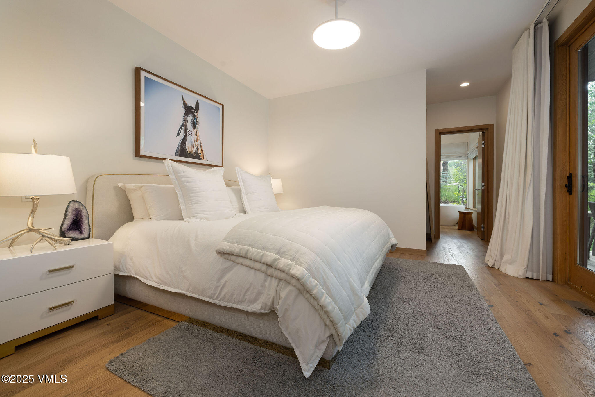 232 Stetson Drive Edwards, CO 81632 - Photo 15 of 25 a bed room with a bed and a night stand