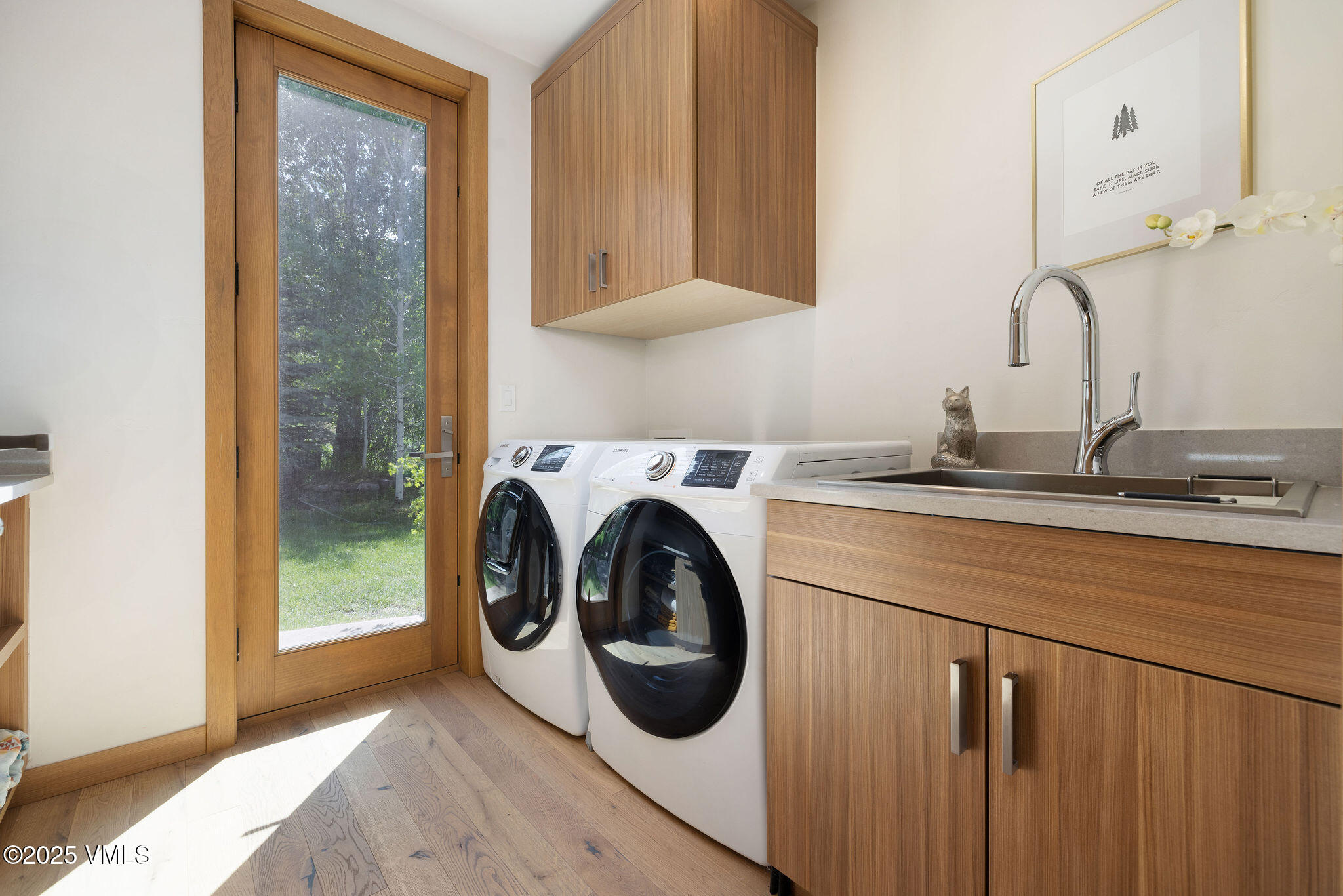 232 Stetson Drive Edwards, CO 81632 - Photo 20 of 25 a utility room with sink dryer and washer