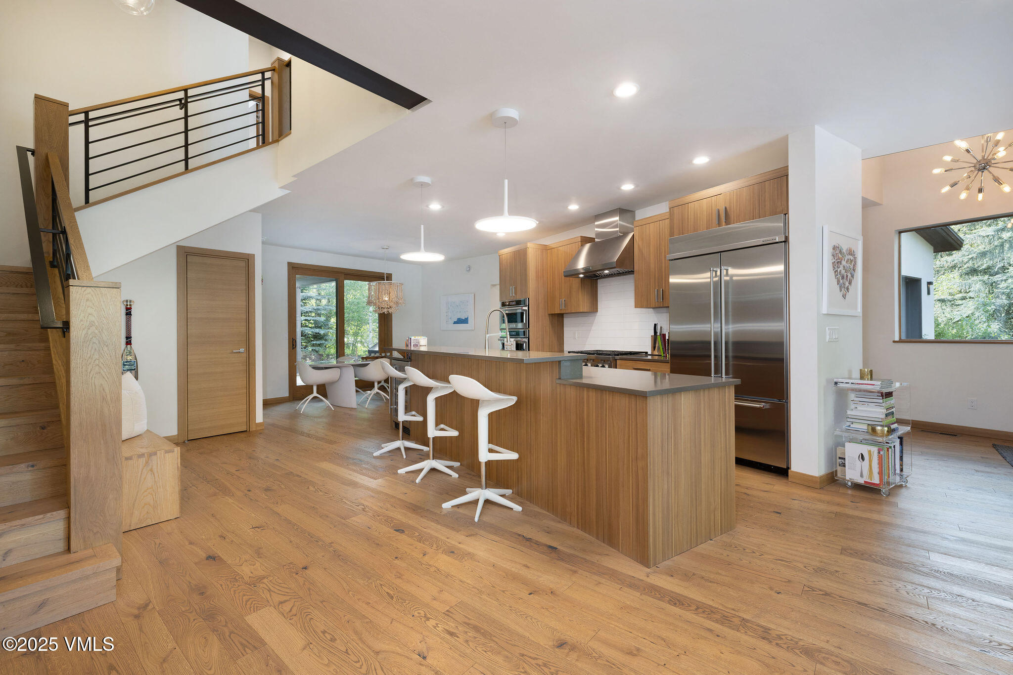 232 Stetson Drive Edwards, CO 81632 - Photo 3 of 25 a room with stainless steel appliances kitchen island granite countertop a refrigerator and cabinets