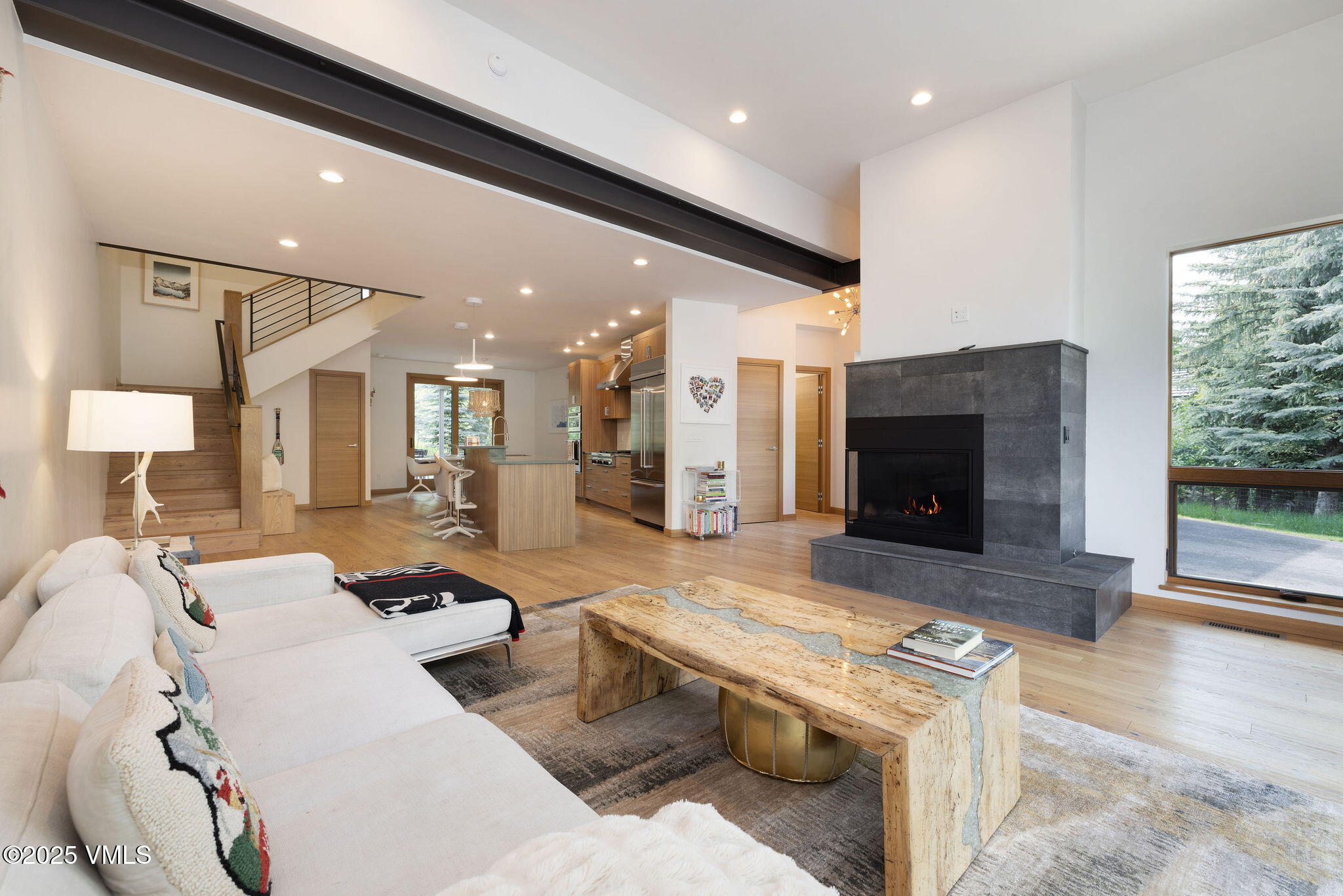 232 Stetson Drive Edwards, CO 81632 - Photo 6 of 25 a living room with furniture and a fireplace