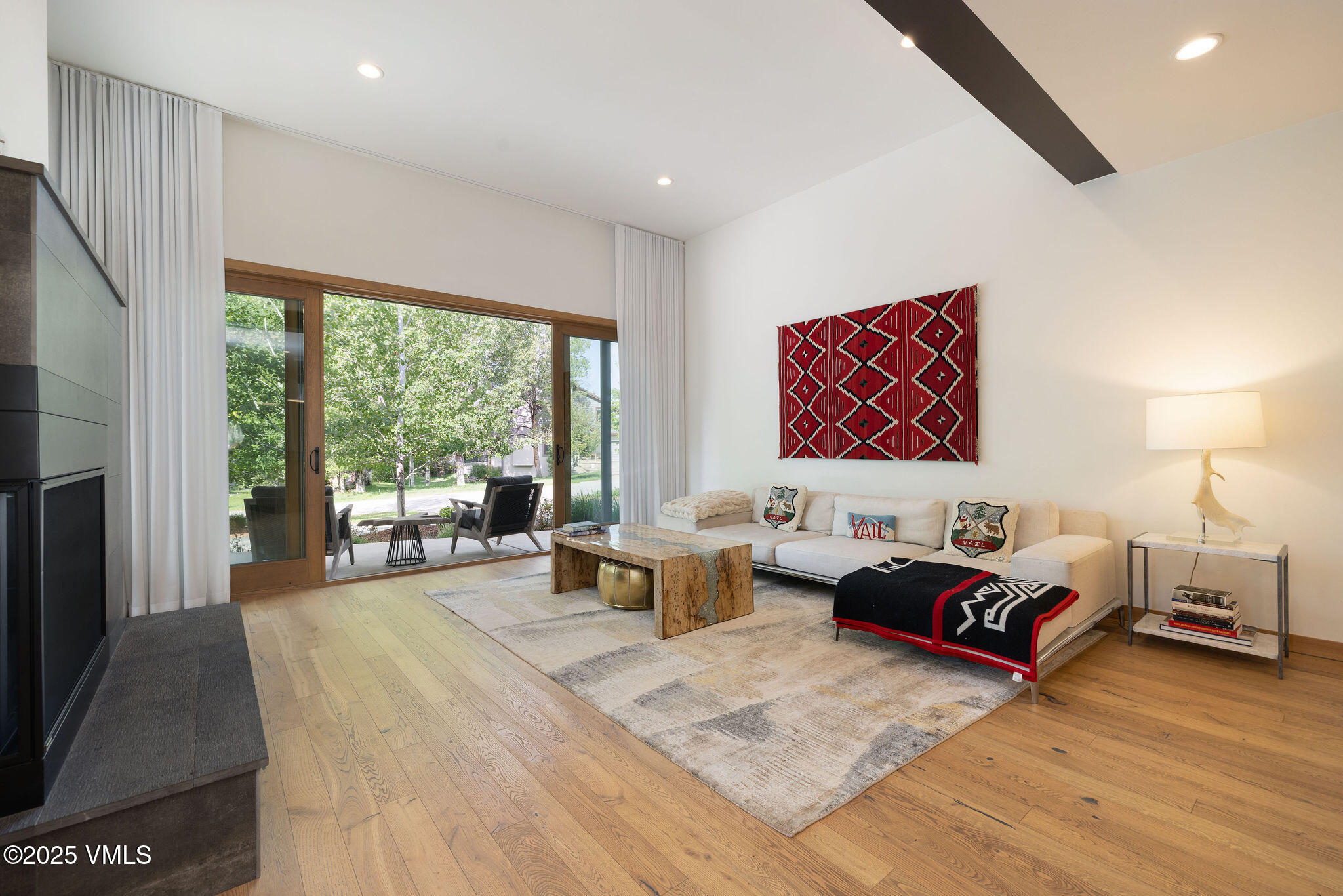 232 Stetson Drive Edwards, CO 81632 - Photo 7 of 25 a living room with furniture and a large window