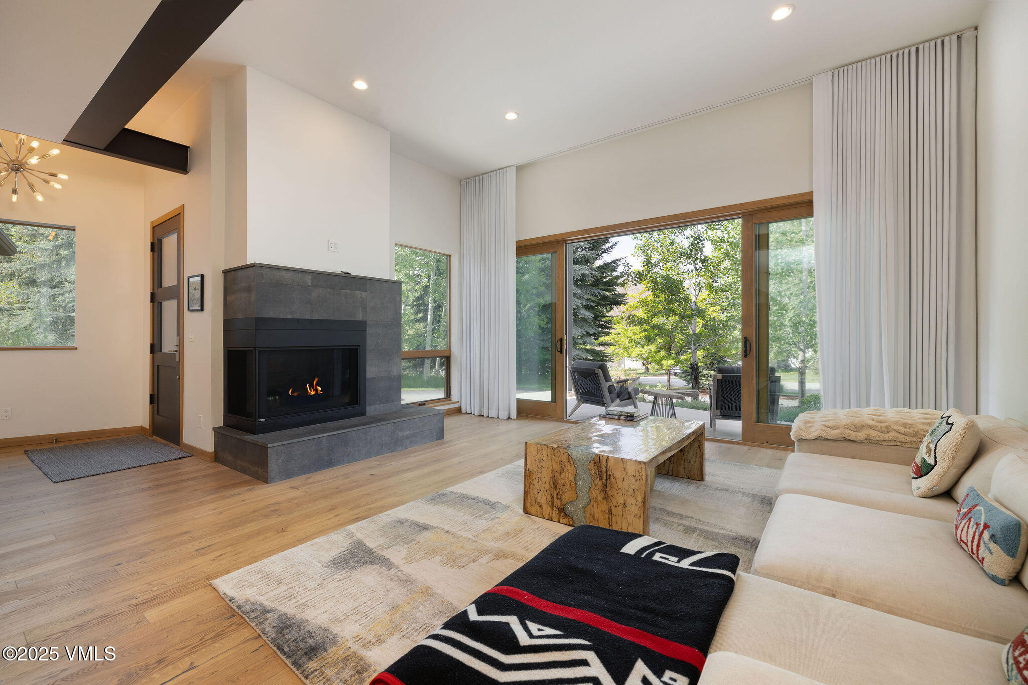 232 Stetson Drive Edwards, CO 81632 - Photo 8 of 25 a living room with furniture and a fireplace
