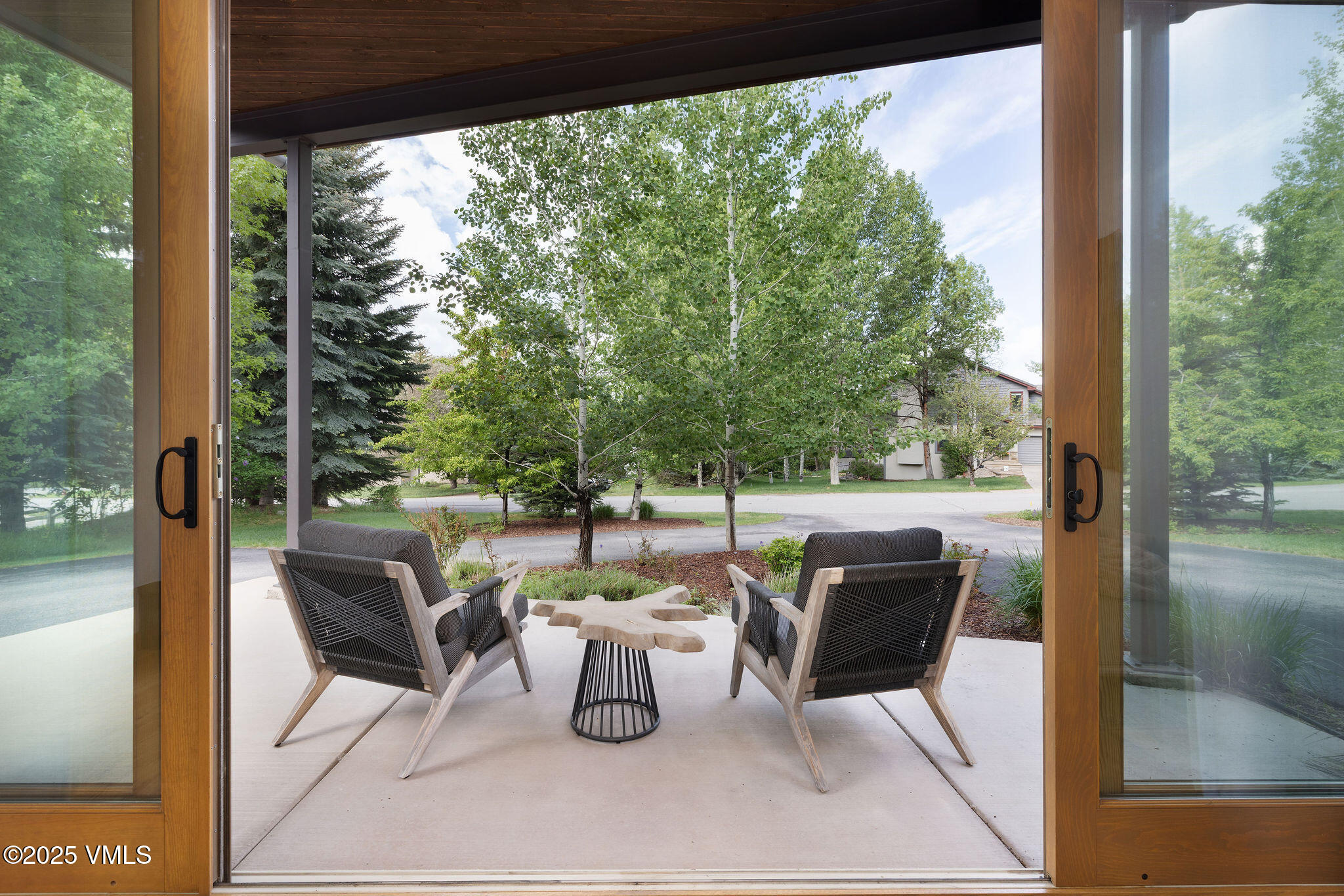 232 Stetson Drive Edwards, CO 81632 - Photo 9 of 25 a view of a porch with chairs and backyard