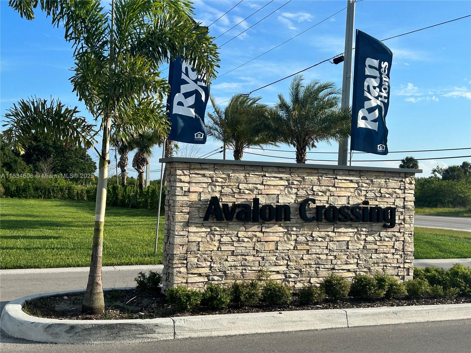 217 Raspberry Road Fort Pierce, FL 34981 - Photo 2 of 39 a view of a street with brick wall and building