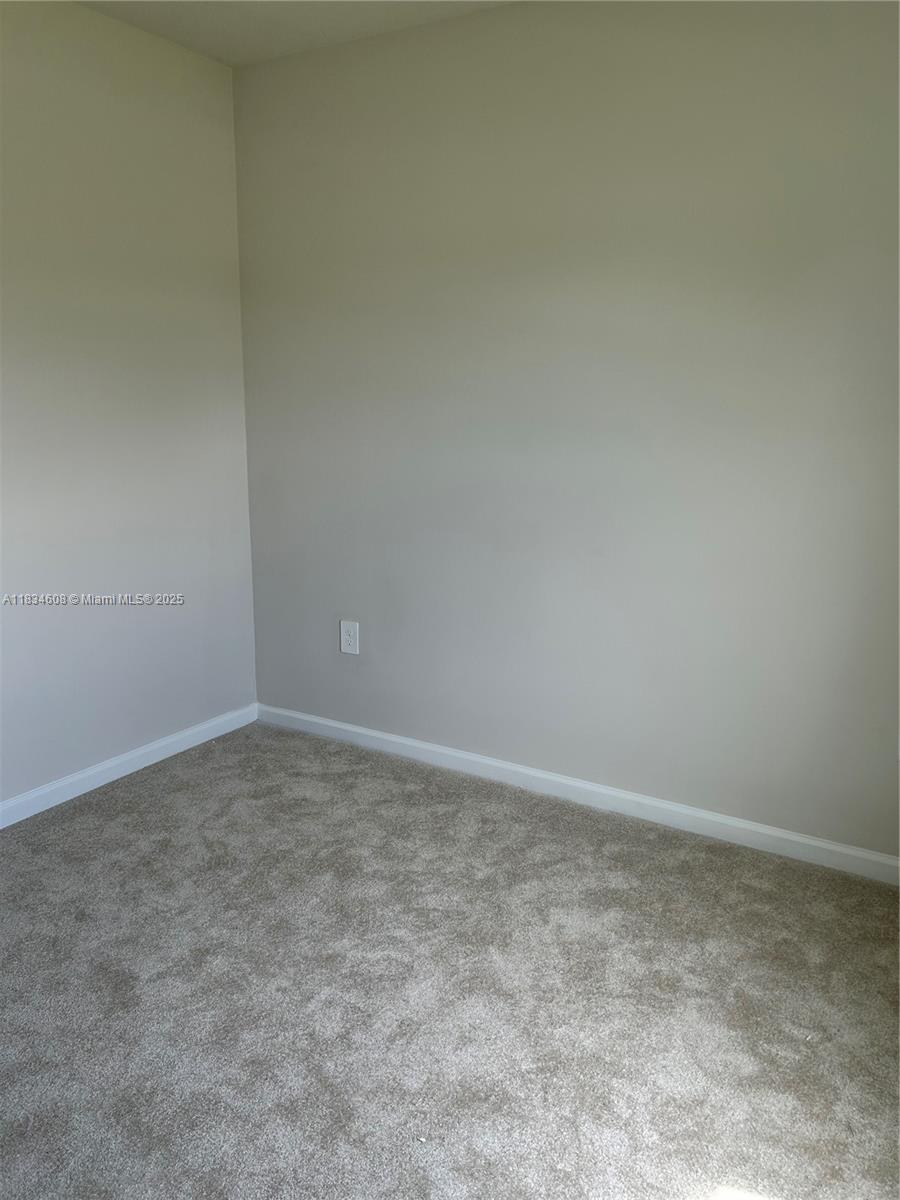217 Raspberry Road Fort Pierce, FL 34981 - Photo 30 of 39 a view of an empty room