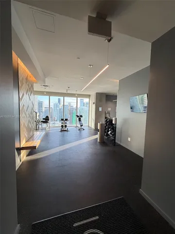 a view of a room with gym equipment