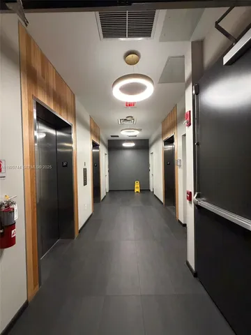 a view of a street with garage