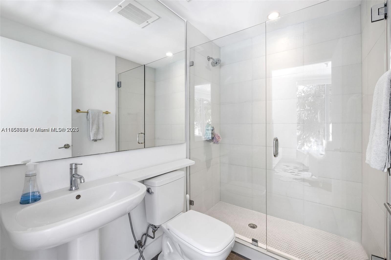 2900 Northeast 7th Avenue, Unit 809 Miami, FL 33137 - Photo 15 of 33 a bathroom with a sink toilet and shower