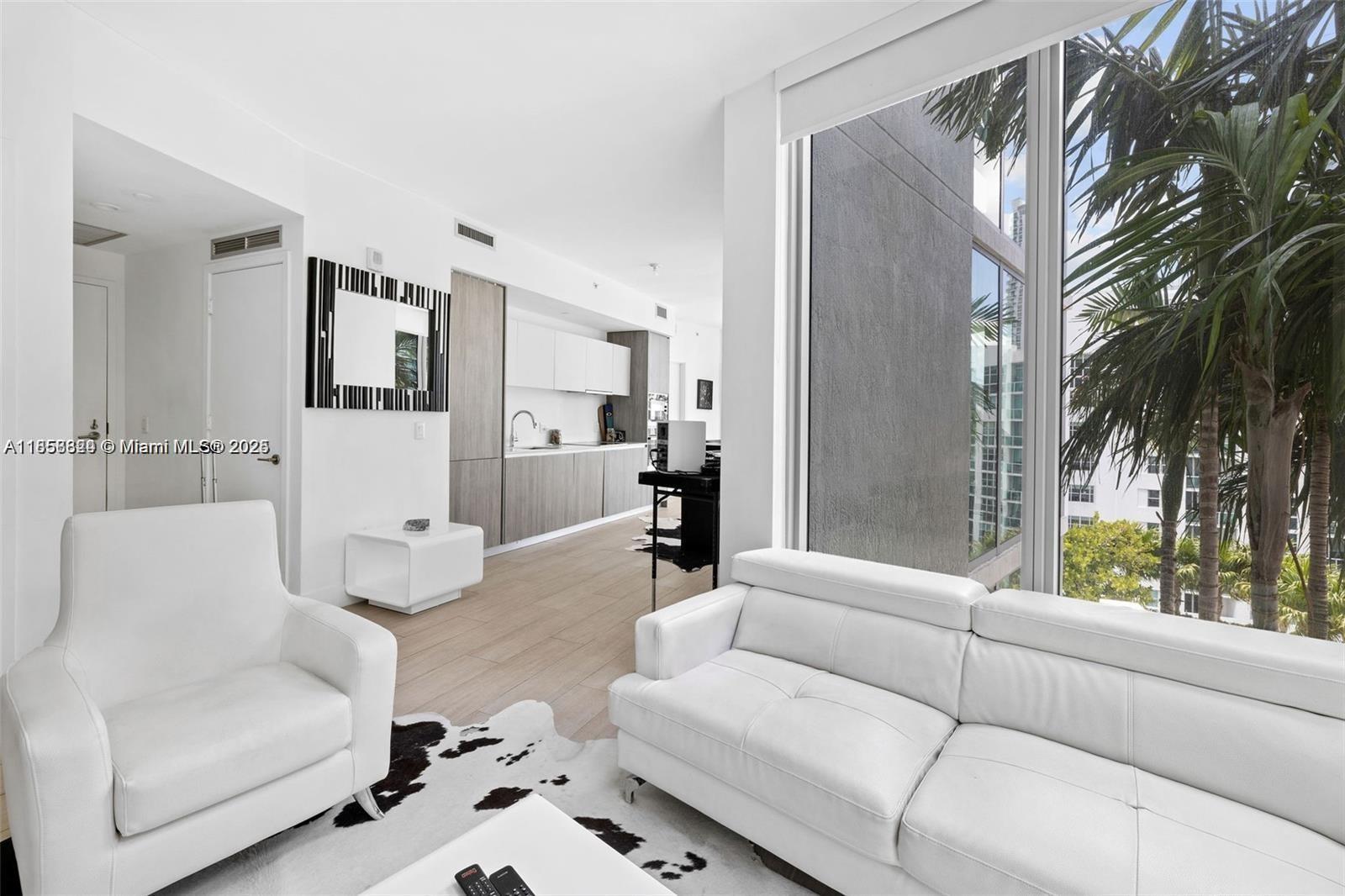 2900 Northeast 7th Avenue, Unit 809 Miami, FL 33137 - Photo 16 of 33 a living room with furniture and a large window