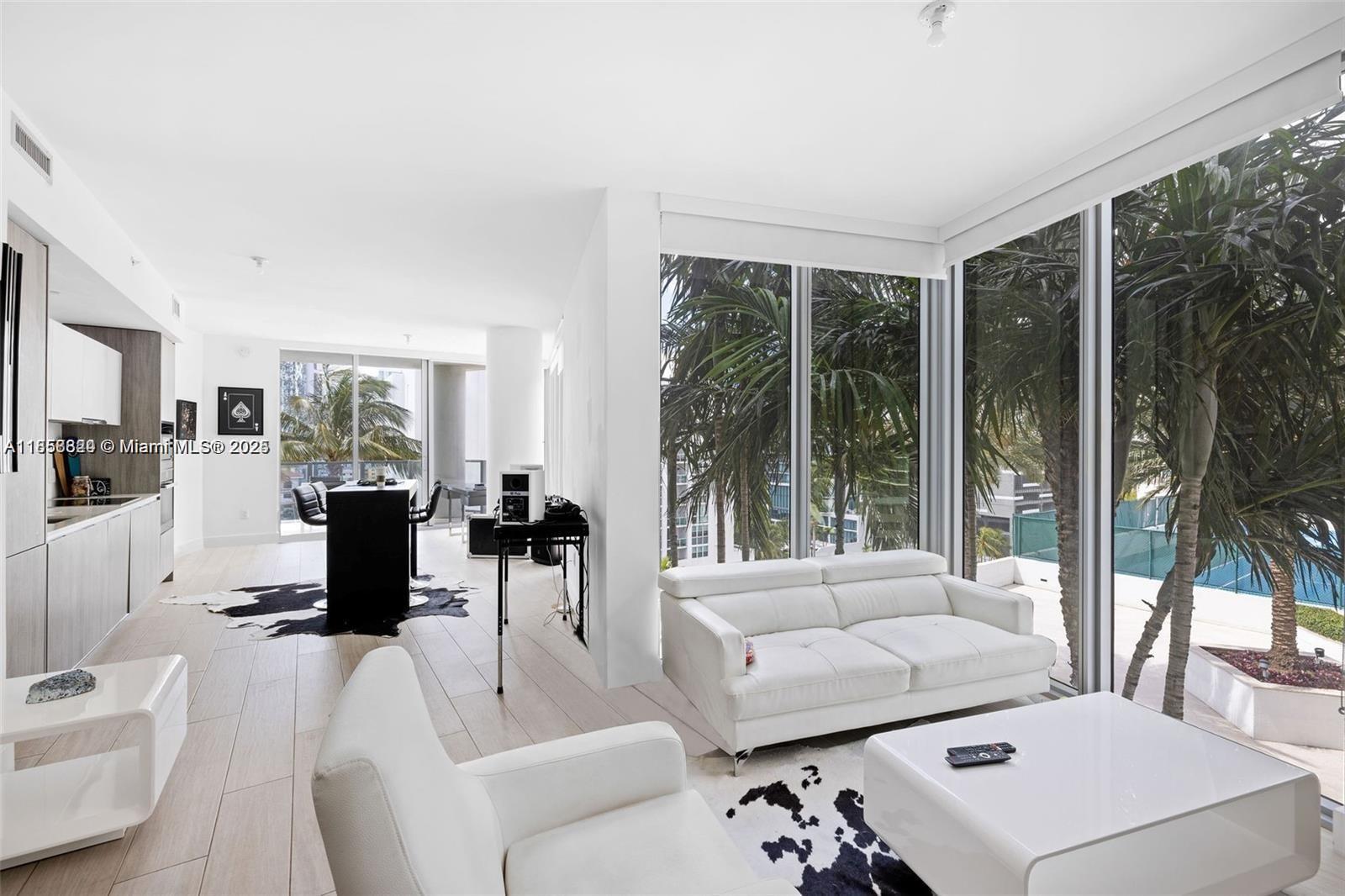 2900 Northeast 7th Avenue, Unit 809 Miami, FL 33137 - Photo 17 of 33 a living room with furniture large window and a large window