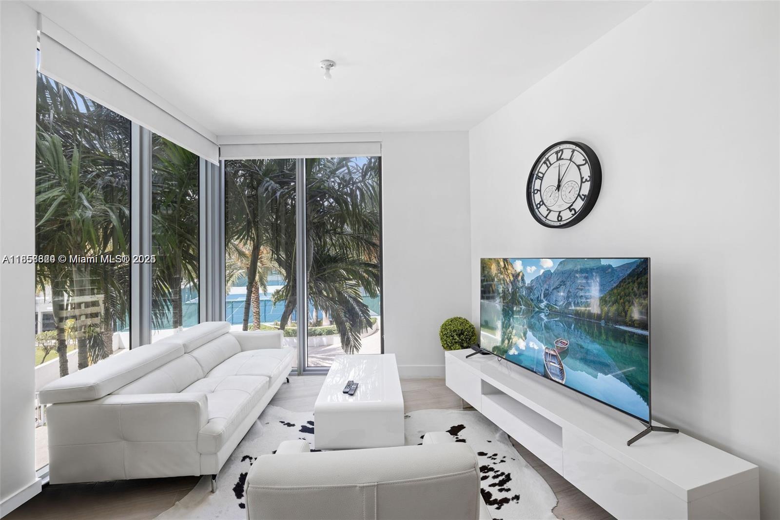 2900 Northeast 7th Avenue, Unit 809 Miami, FL 33137 - Photo 18 of 33 a living room with couch and a large window