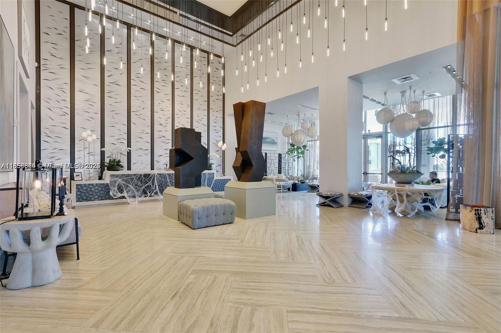 2900 Northeast 7th Avenue, Unit 809 Miami, FL 33137 - Photo 32 of 33 a bedroom with furniture and large windows