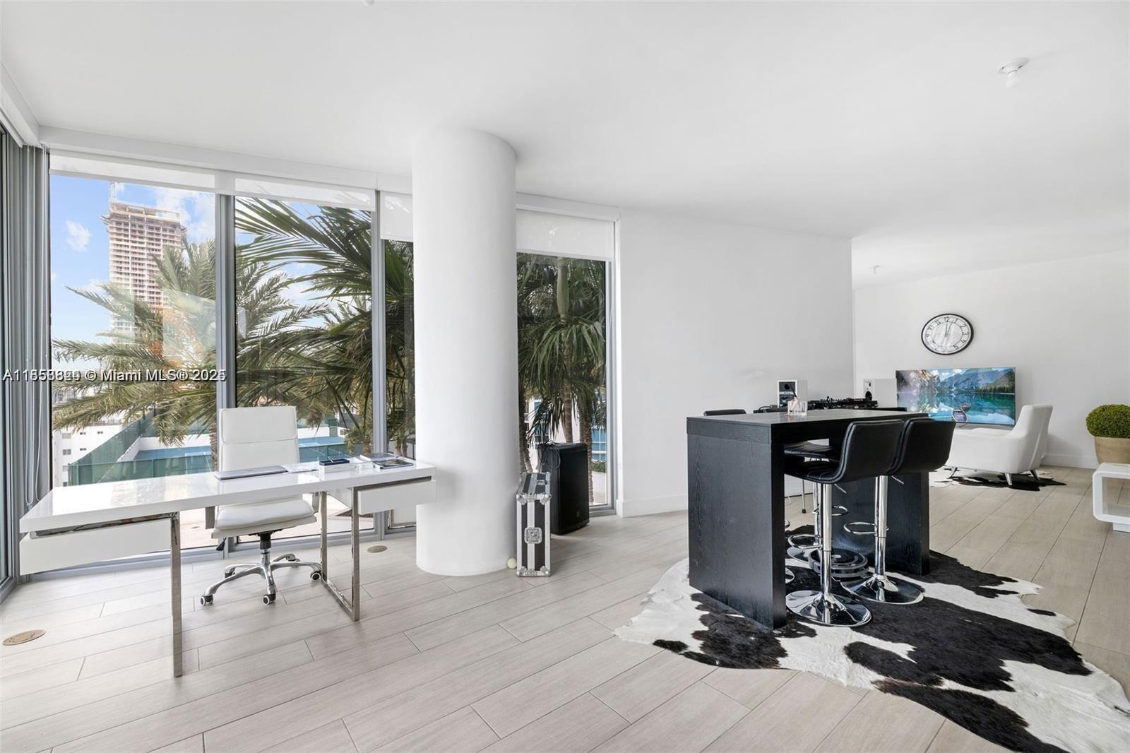2900 Northeast 7th Avenue, Unit 809 Miami, FL 33137 - Photo 10 of 33 a view of a livingroom with furniture and front door