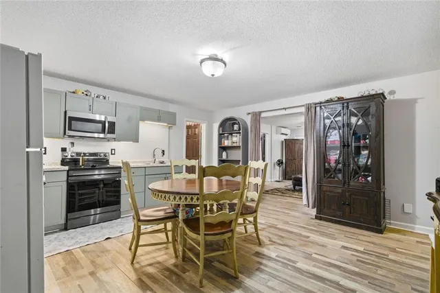 a view of a dining room with furniture