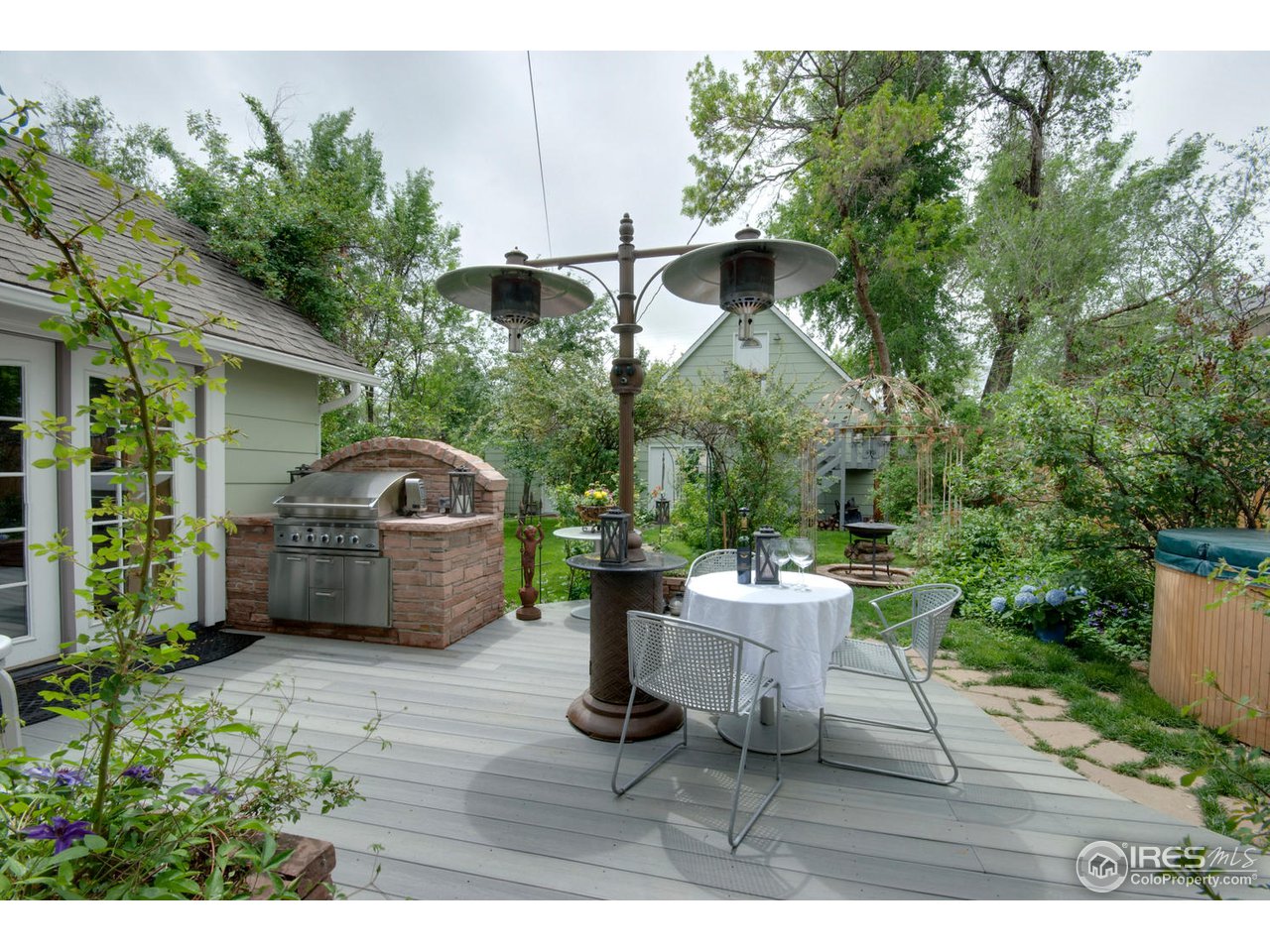 406 East Baseline Road Lafayette, CO 80026 - Photo 20 of 24 a view of a chairs and table in backyard of the house