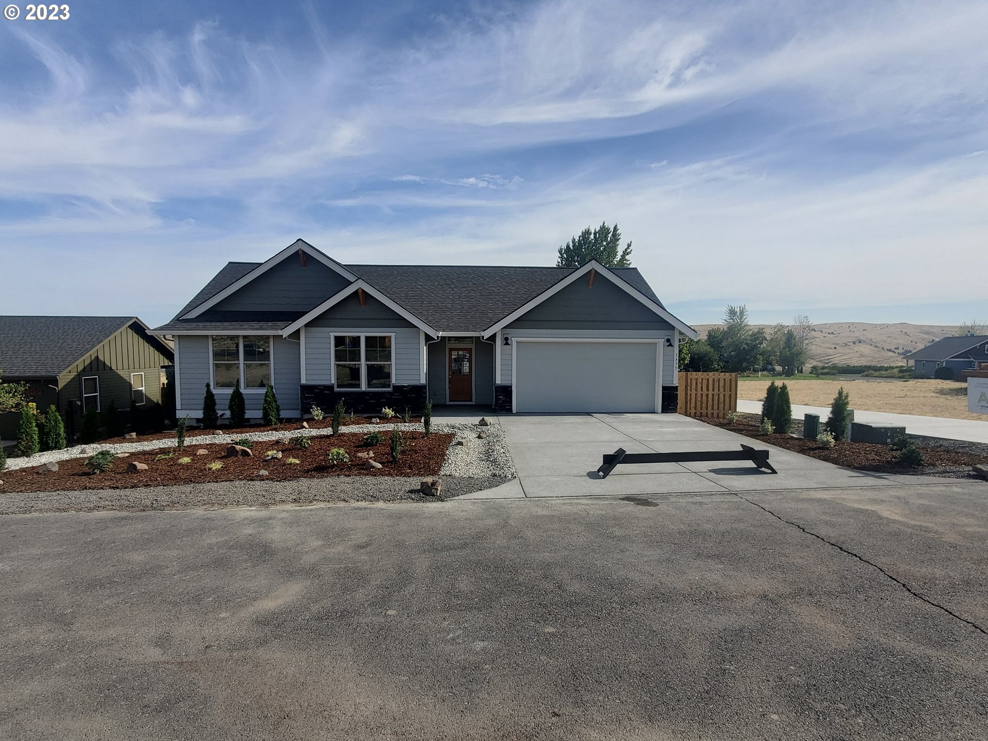 1435 Fish Tail Road Maupin, OR 97037 - Photo 23 of 31 a view of house with outdoor space and parking