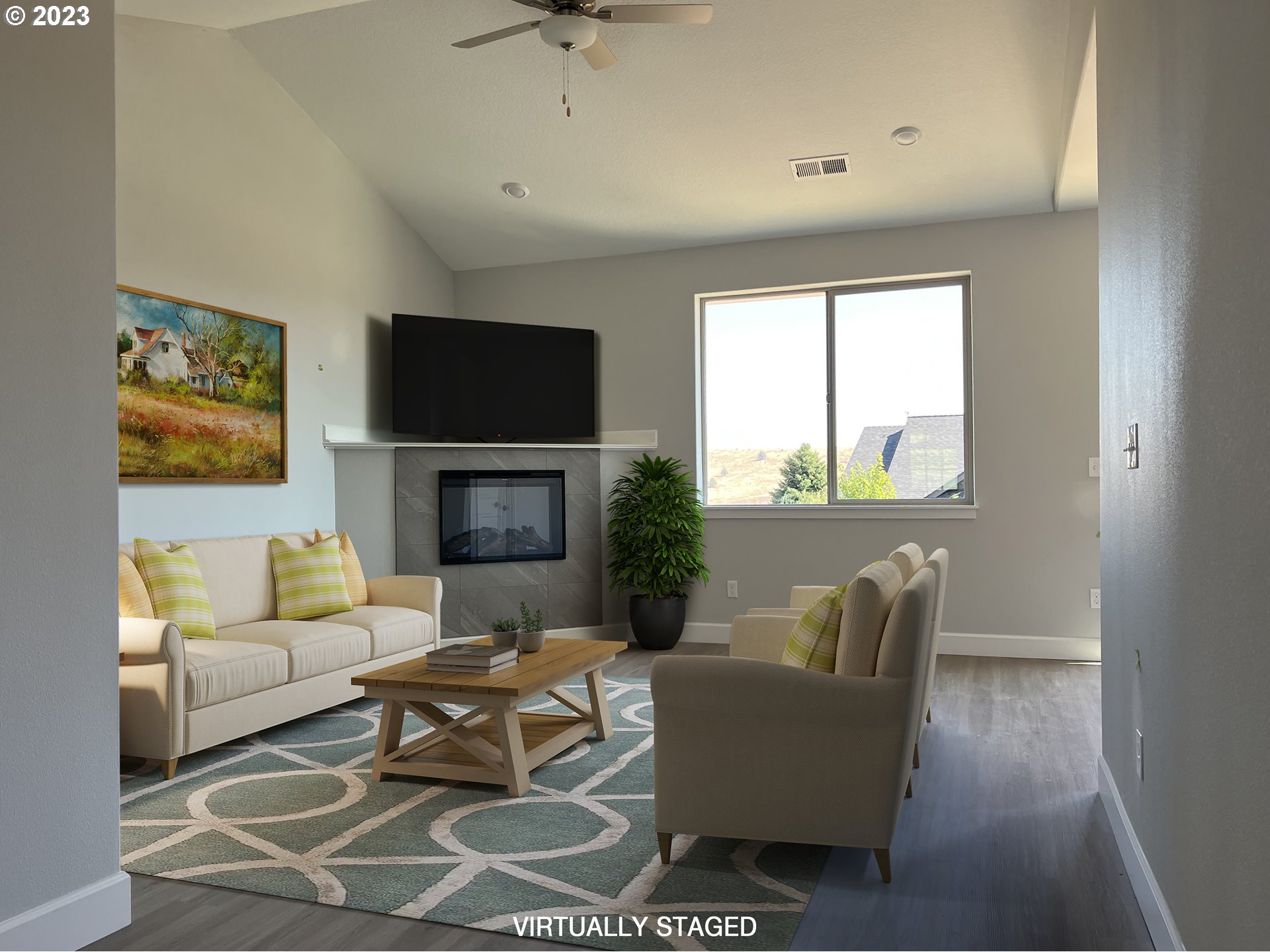 1435 Fish Tail Road Maupin, OR 97037 - Photo 4 of 31 a living room with furniture a flat screen tv and a fireplace