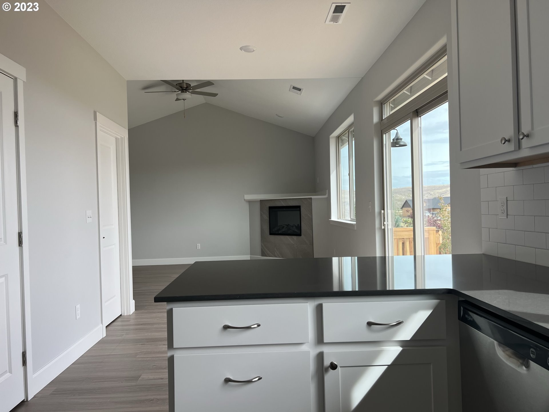 1435 Fish Tail Road Maupin, OR 97037 - Photo 8 of 31 a kitchen with a refrigerator and a sink