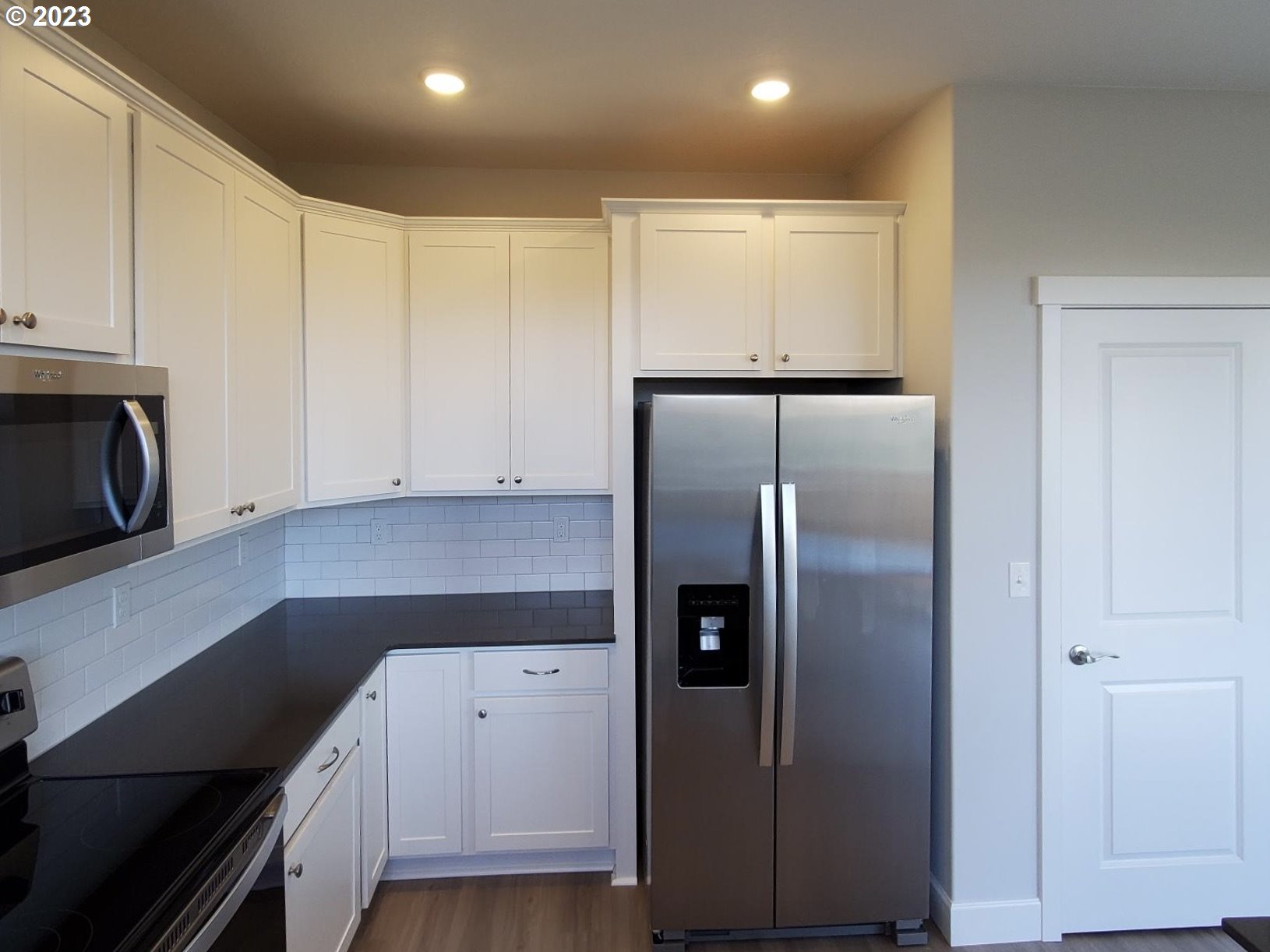 1435 Fish Tail Road Maupin, OR 97037 - Photo 9 of 31 a kitchen with a refrigerator and a stove top oven