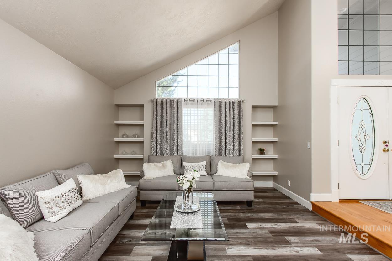 5674 North Heathrow Way Boise, ID 83713 - Photo 3 of 41 High vaulted ceilings featuring a large triangular grid window