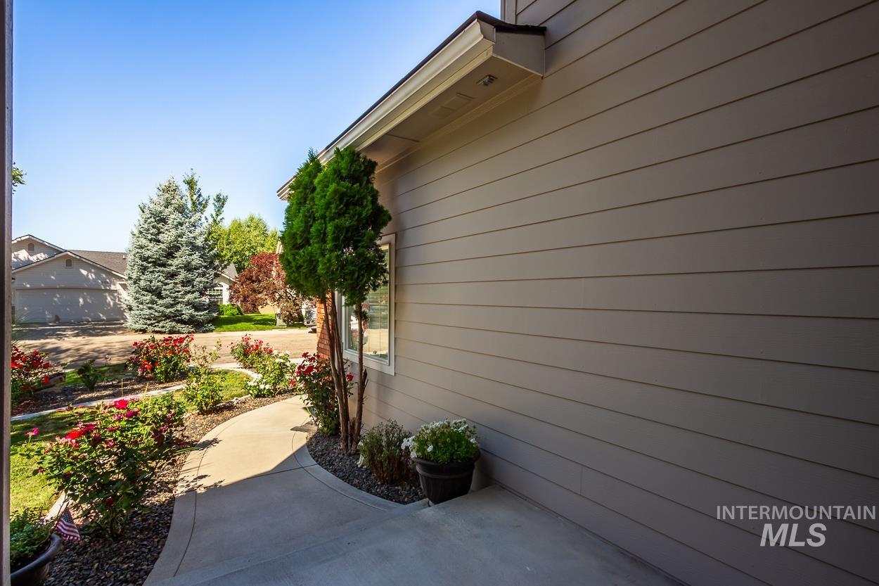 5674 North Heathrow Way Boise, ID 83713 - Photo 41 of 41 Exterior siding in a neutral tone with white trim