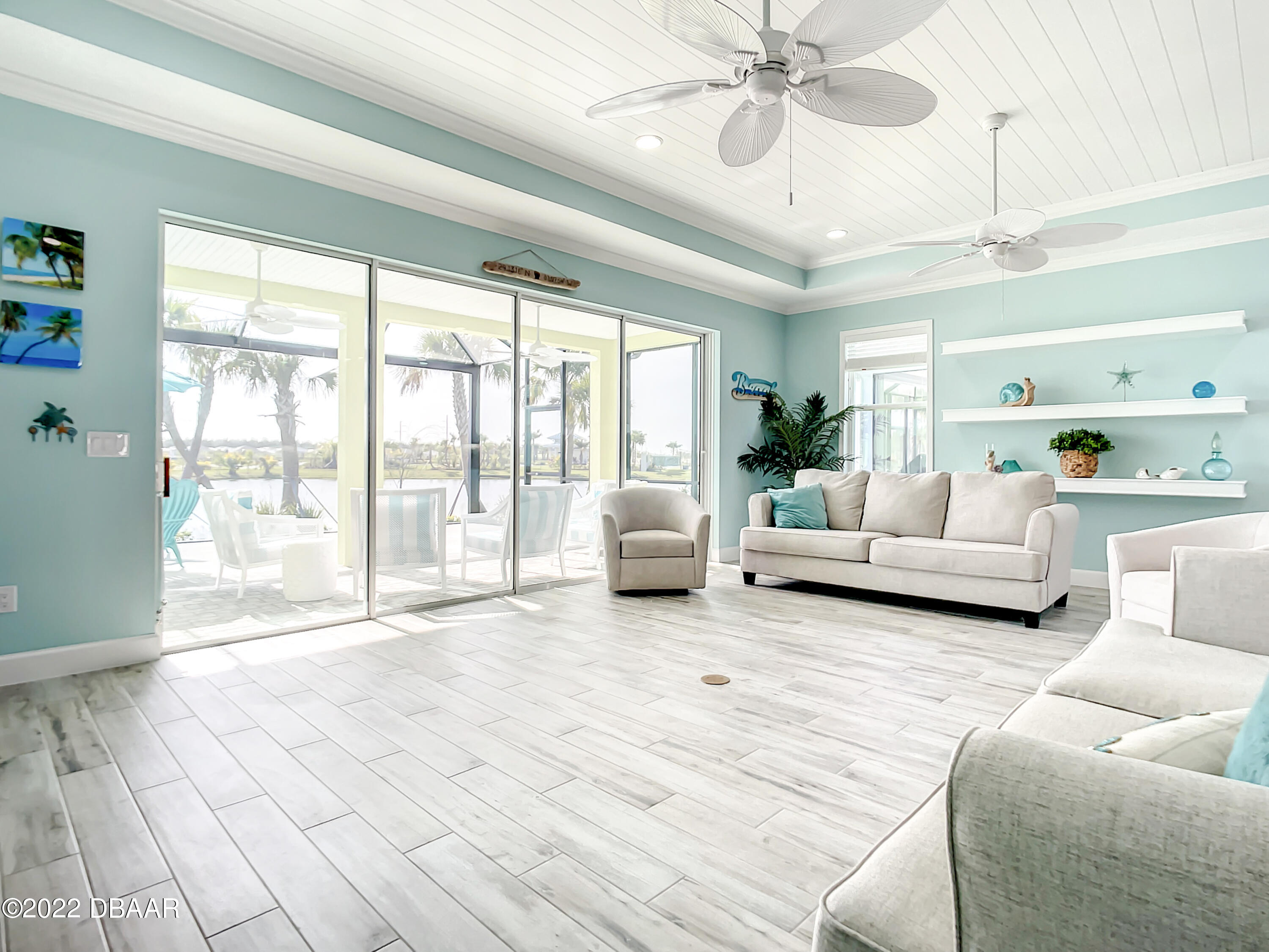 124 Red Lighthouse Point Daytona Beach, FL 32124 - Photo 14 of 54 a living room with furniture and a large window