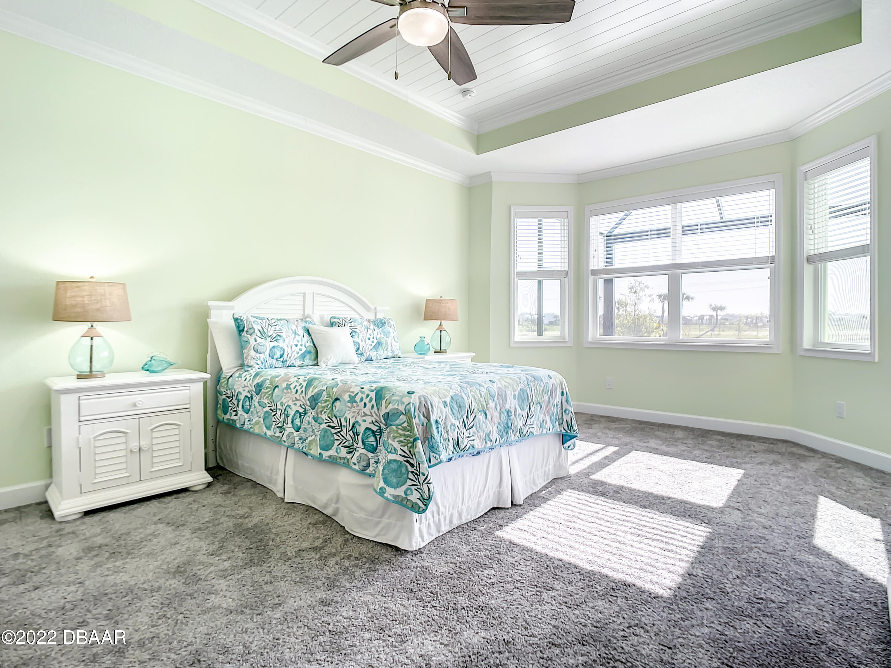 124 Red Lighthouse Point Daytona Beach, FL 32124 - Photo 18 of 54 a bedroom with a bed and a window