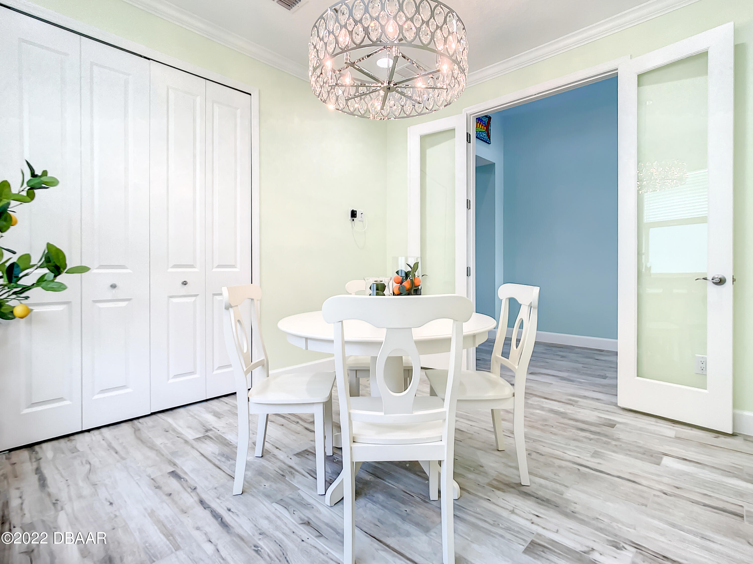 124 Red Lighthouse Point Daytona Beach, FL 32124 - Photo 23 of 54 a dining room with furniture and wooden floor