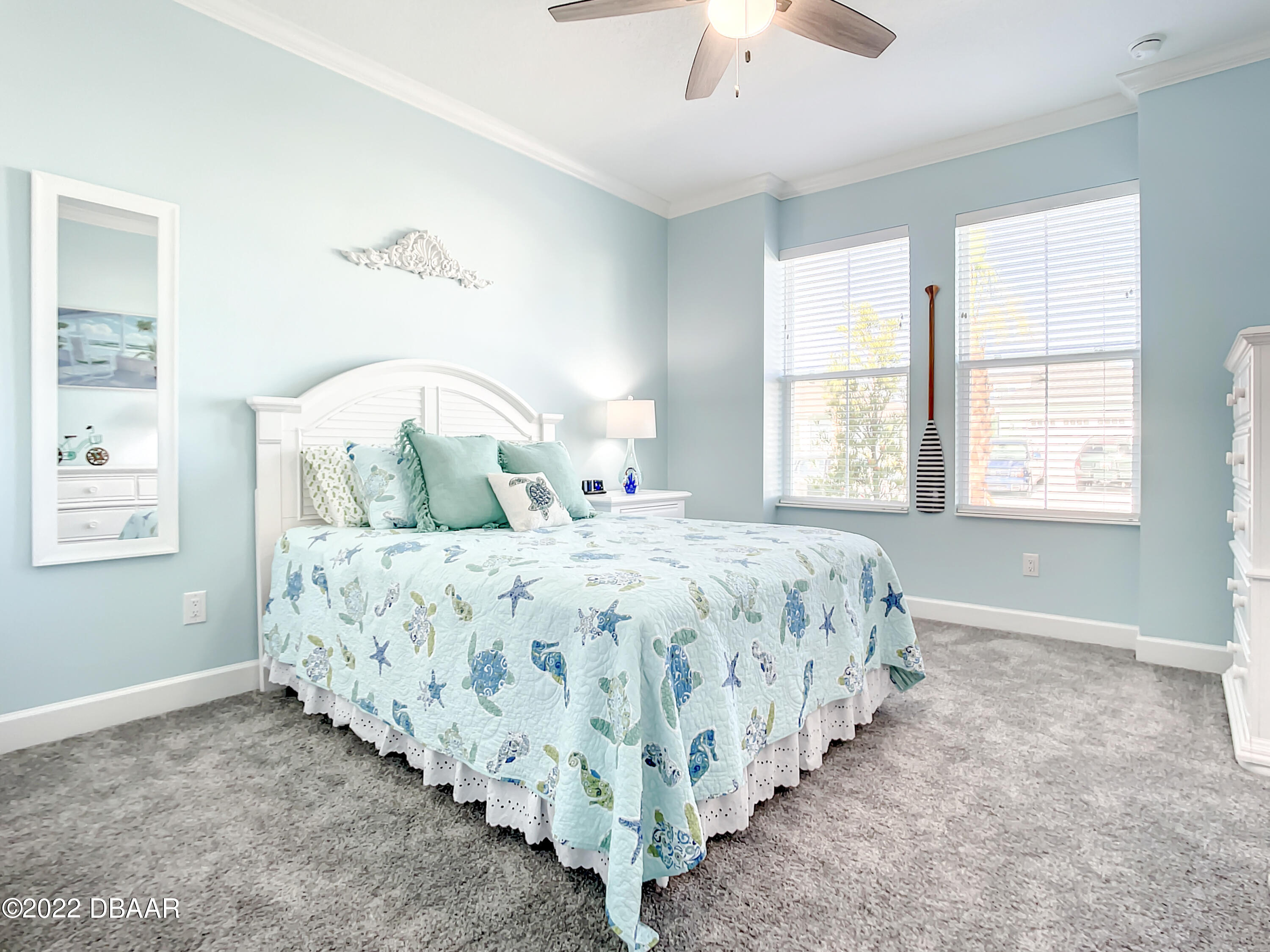 124 Red Lighthouse Point Daytona Beach, FL 32124 - Photo 28 of 54 a spacious bedroom with a bed and a window