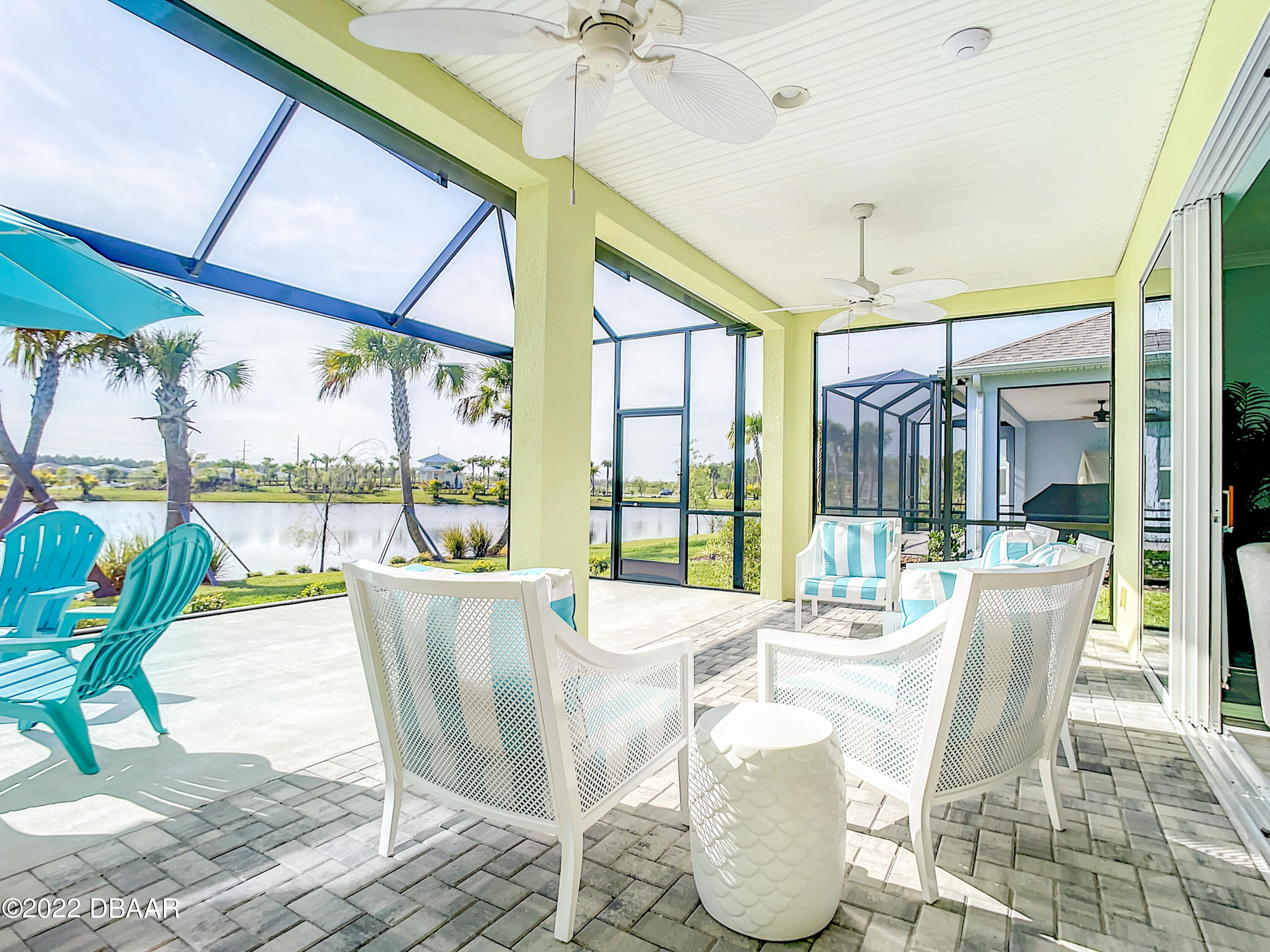 124 Red Lighthouse Point Daytona Beach, FL 32124 - Photo 34 of 54 a living room with a floor to ceiling window and wooden floor