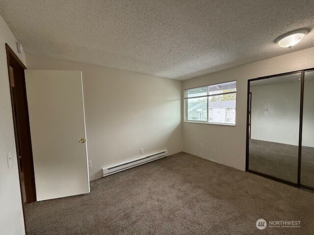 1913 Coolidge Road Aberdeen, WA 98520 - Photo 13 of 18 an empty room with windows