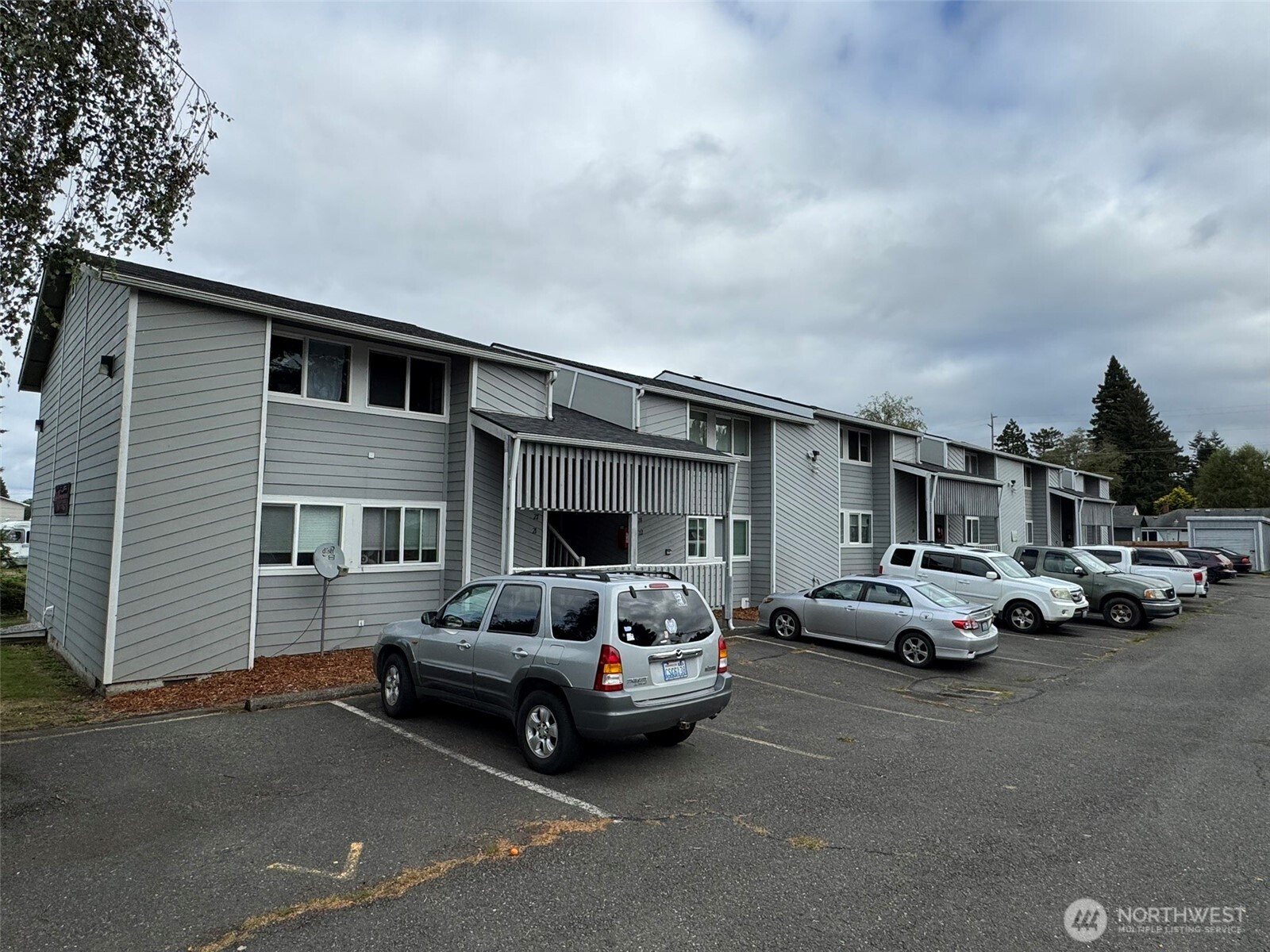 1913 Coolidge Road Aberdeen, WA 98520 - Photo 8 of 18 a car parked in front of a house