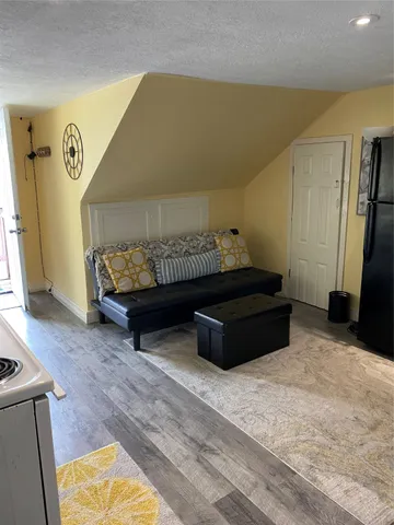 a bed room with a bed and a couch