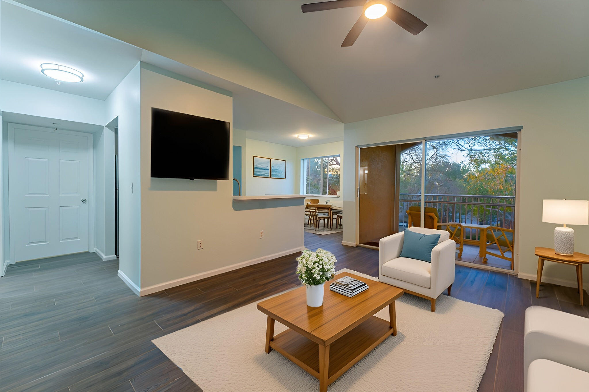 236 Village Boulevard, Unit 1304 Tequesta, FL 33469 - Photo 14 of 30 a living room with furniture and a flat screen tv