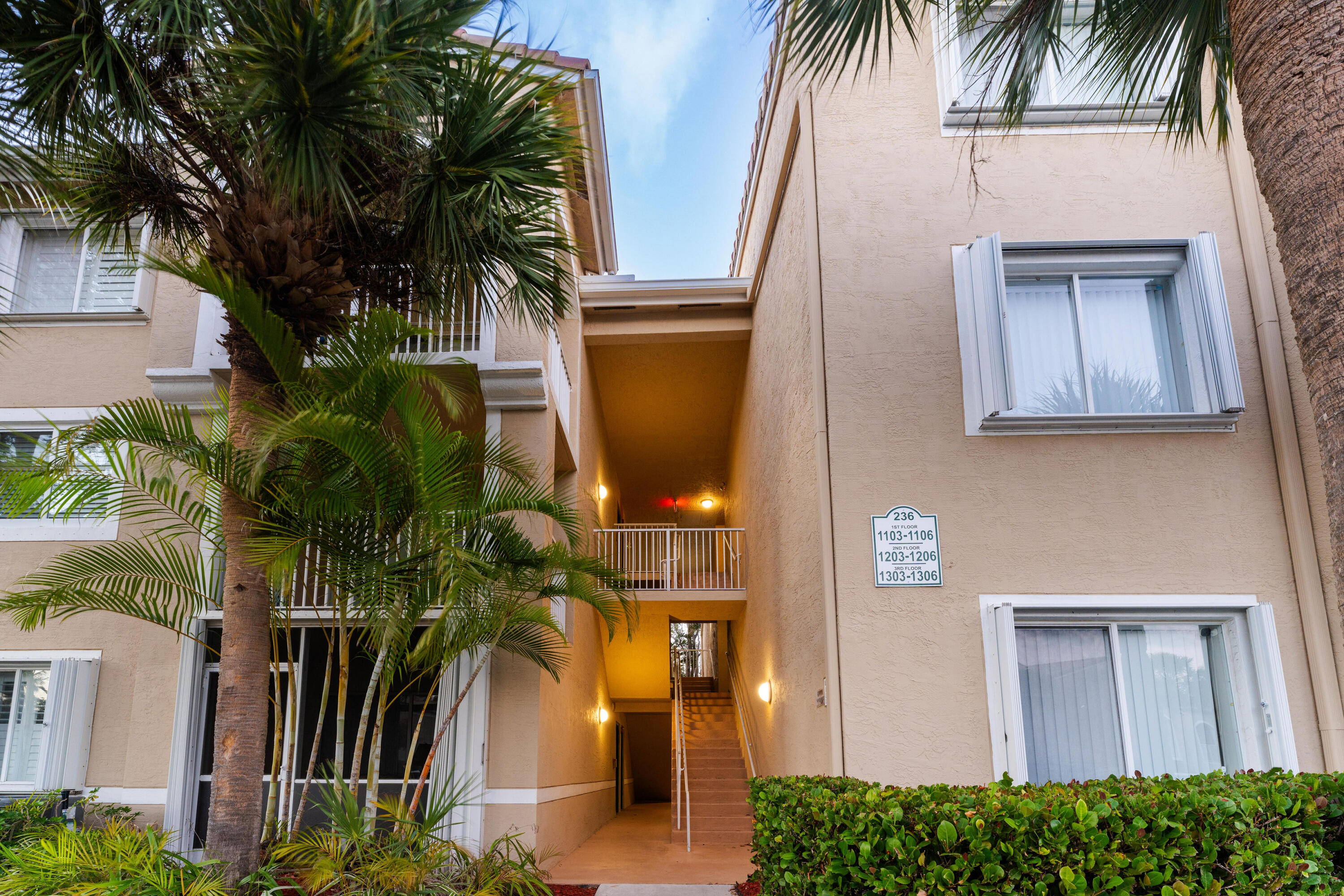 236 Village Boulevard, Unit 1304 Tequesta, FL 33469 - Photo 17 of 30 a view of a house with a tree in front