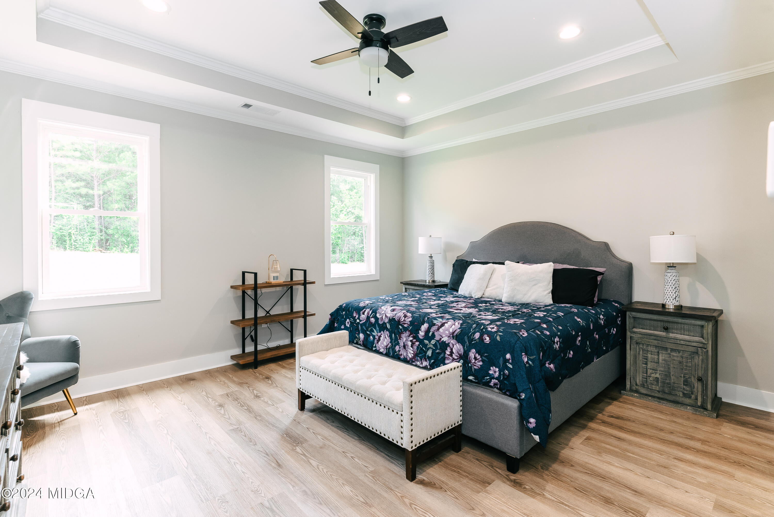 1190 Josey Road Forsyth, GA 31029 - Photo 14 of 25 a bedroom with a bed couch and window
