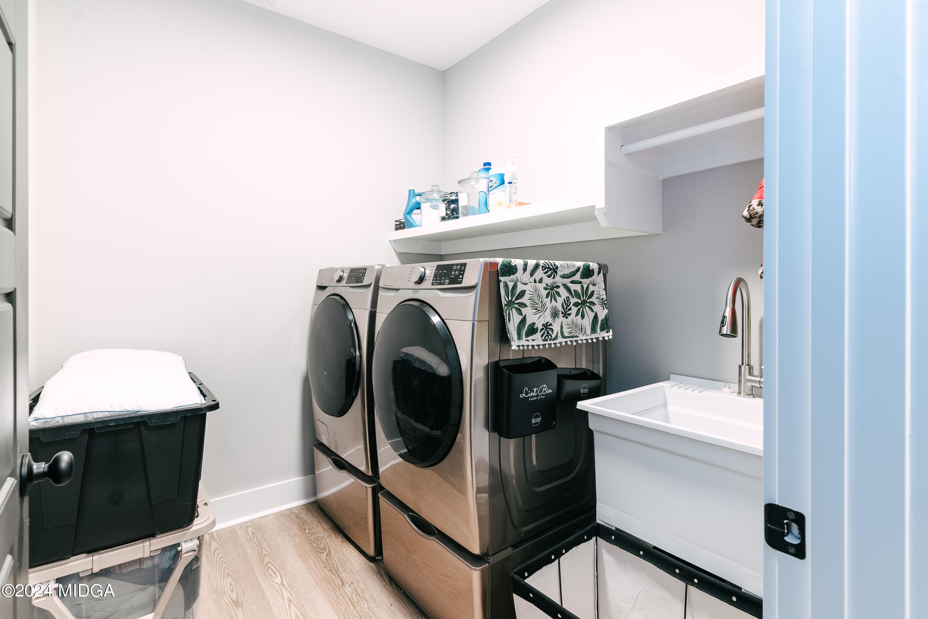 1190 Josey Road Forsyth, GA 31029 - Photo 19 of 25 a utility room with dryer and washer
