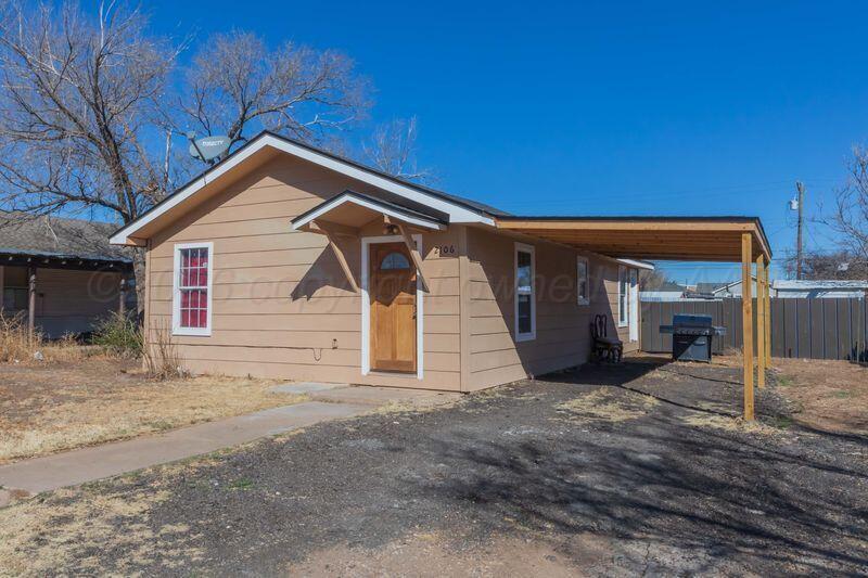 a view of a house with a patio