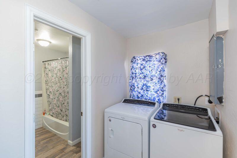2106 Southwest 1st Avenue Amarillo, TX 79106 - Photo 11 of 17 a view of a utility room with washer and dryer