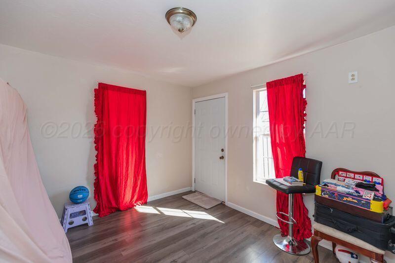 2106 Southwest 1st Avenue Amarillo, TX 79106 - Photo 14 of 17 a view of a room with gym equipment