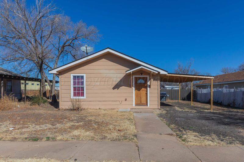 2106 Southwest 1st Avenue Amarillo, TX 79106 - Photo 17 of 17 a view of a house with a yard