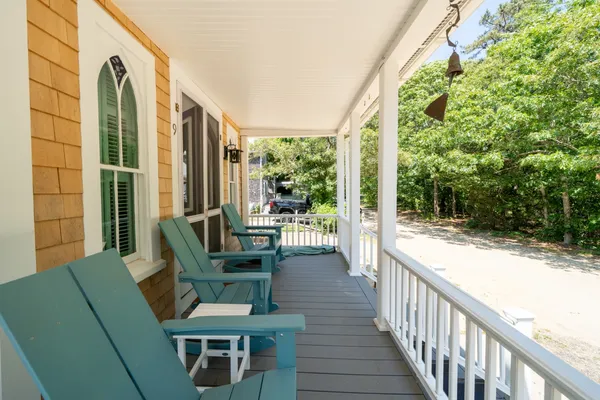 a front view of a house with a porch